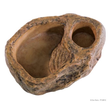 Natural stone reptile hide cave for terrariums and reptile enclosures. Provides a secure hiding spot.