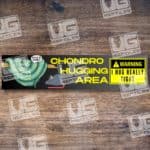 Chondro Huggings Area with warning sign for tight hug zone.