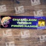 Chameleon tongue firing range warning sign with colorful chameleon graphic.